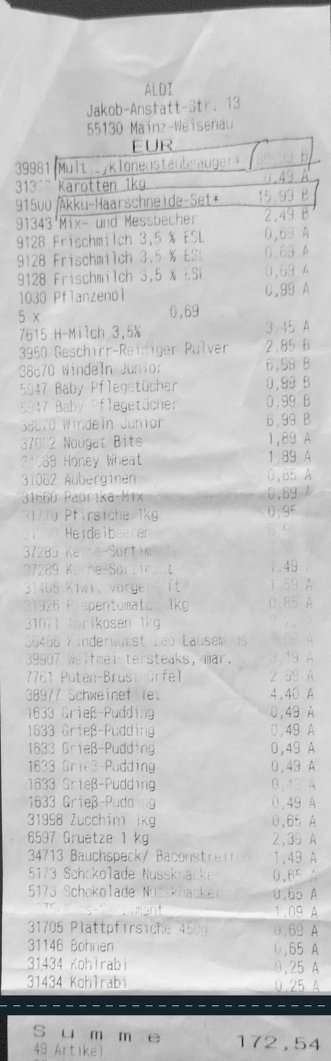 Langer, dunkel fotografierter ALDI-Kassenbon mit 49 Artikeln von 2014