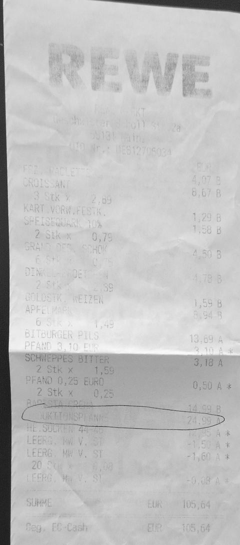 Fast weißer, zerknitterter REWE-Kassenbon von 2014